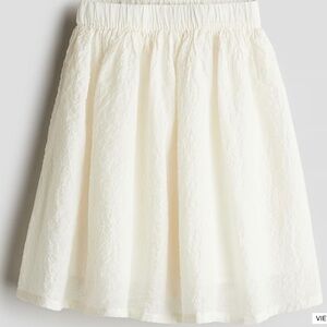 H&M cream textured mini skirt Sz M